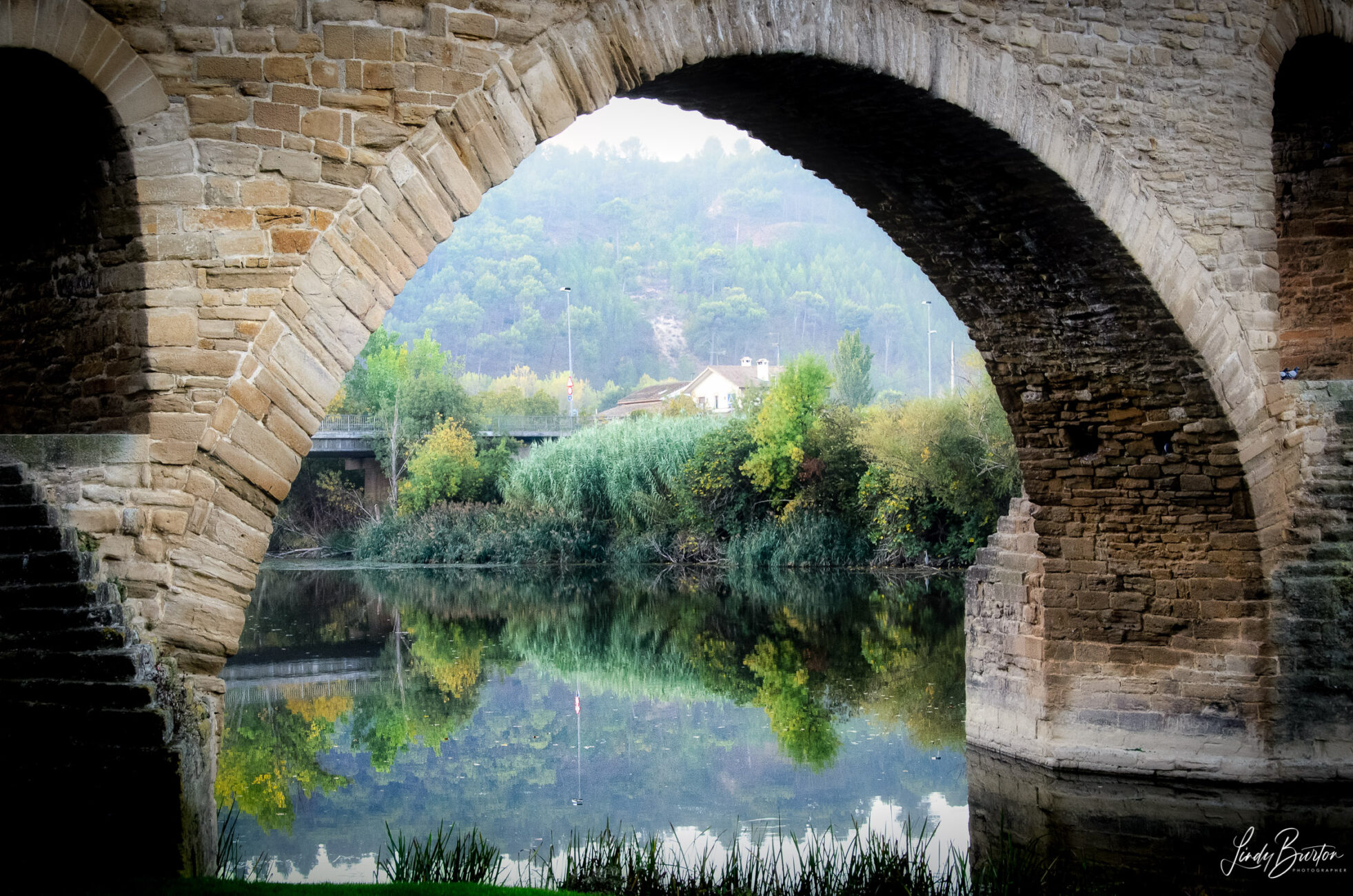 Camino Frances view under the bridge at Puenta la Reina Spain